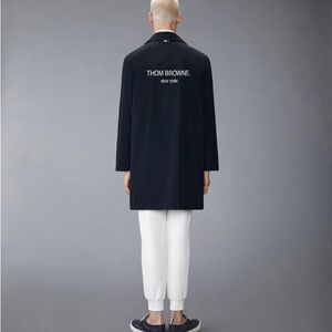 Thom Browne Memory Tech Packable Smock in the color: NAVY
